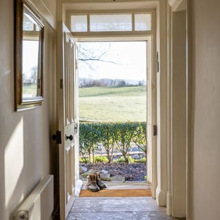 view out from the hallway of a country home to countryside