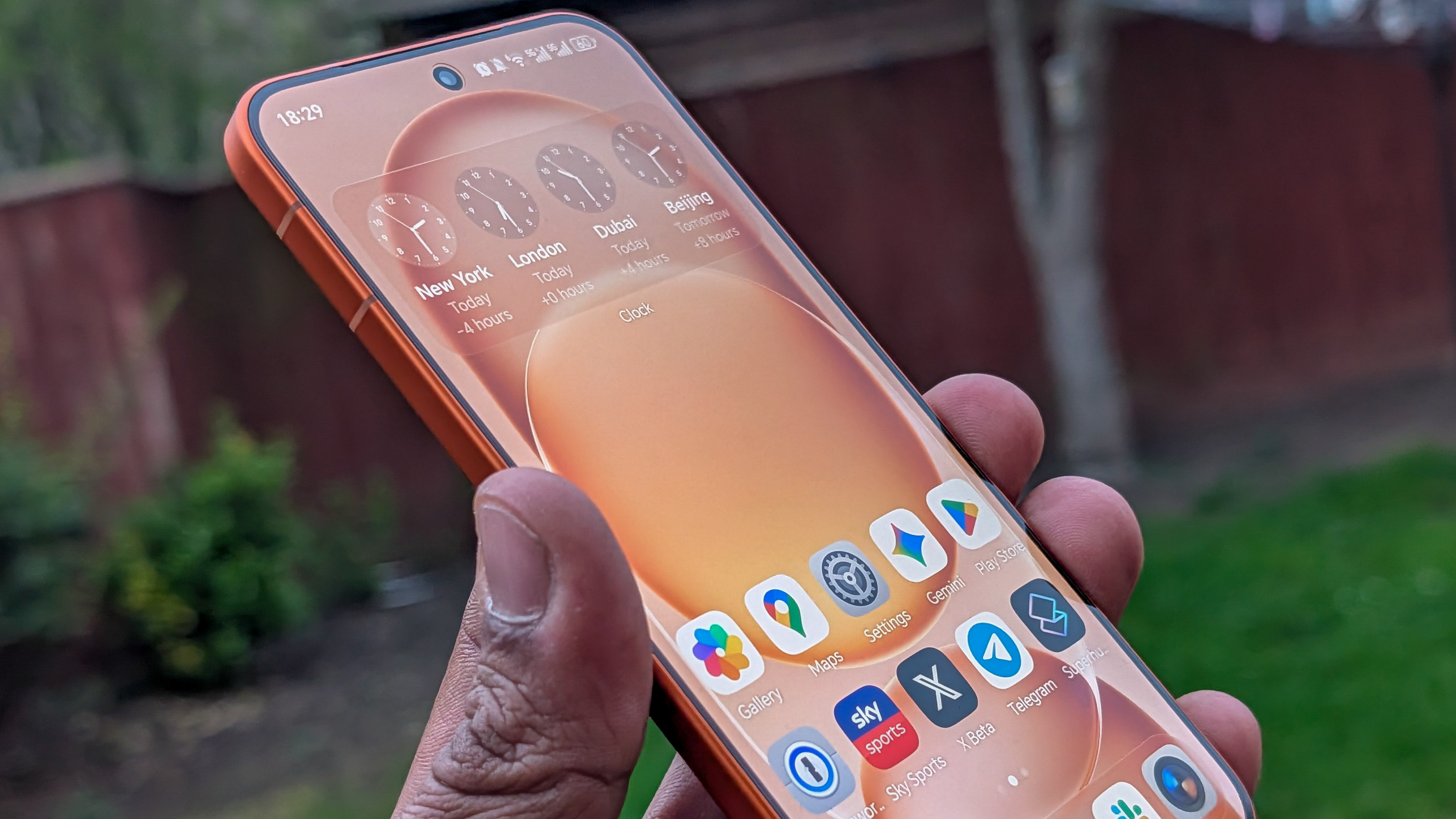 Honor Magic 8 Pro Air in Orange in the hand