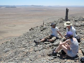 Researchers in southern Namibia doing fieldwork where they discovered the world's oldest known aquatic reef.