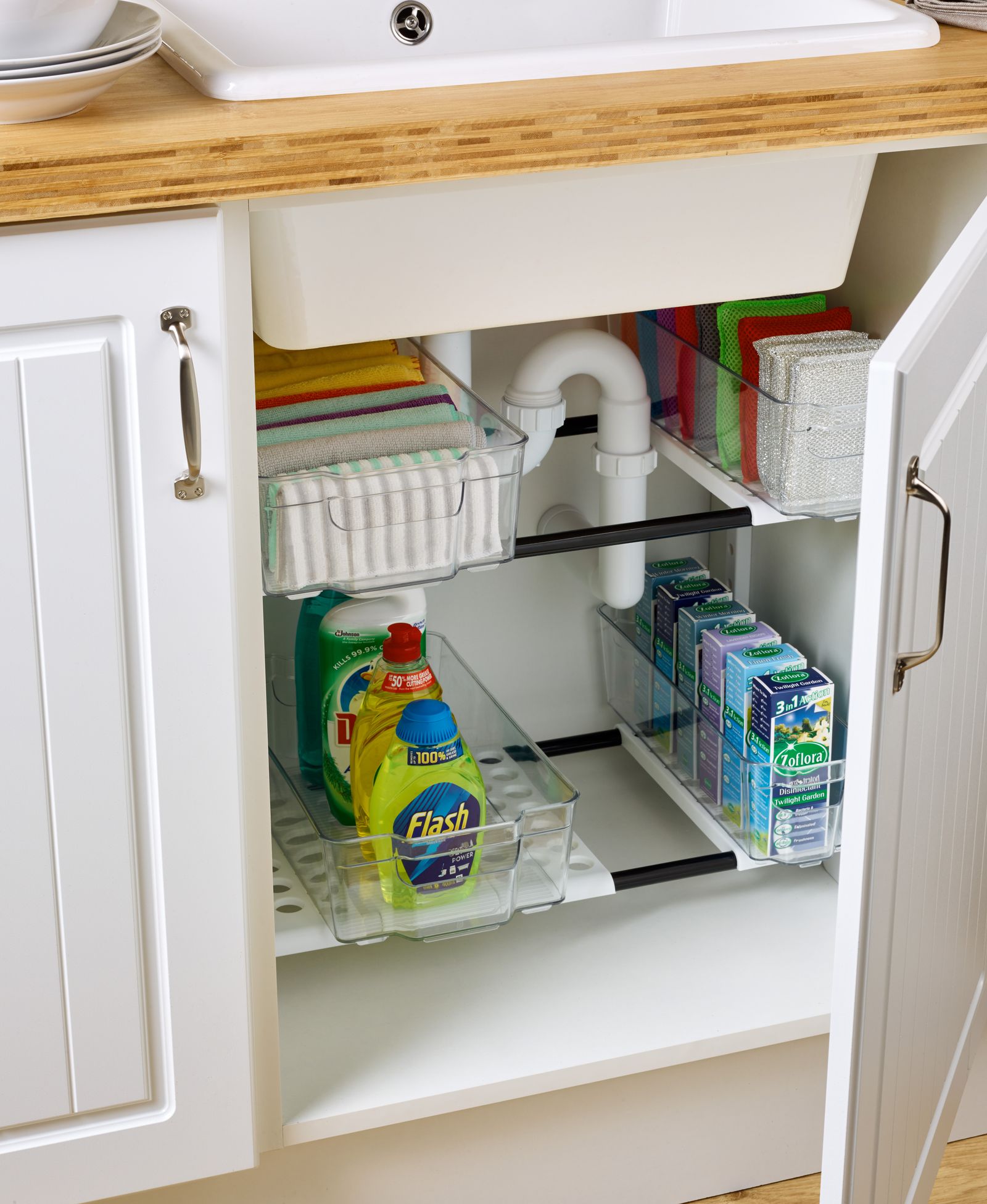 Organizing under the sink: keep supplies neat and accessible | Homes ...