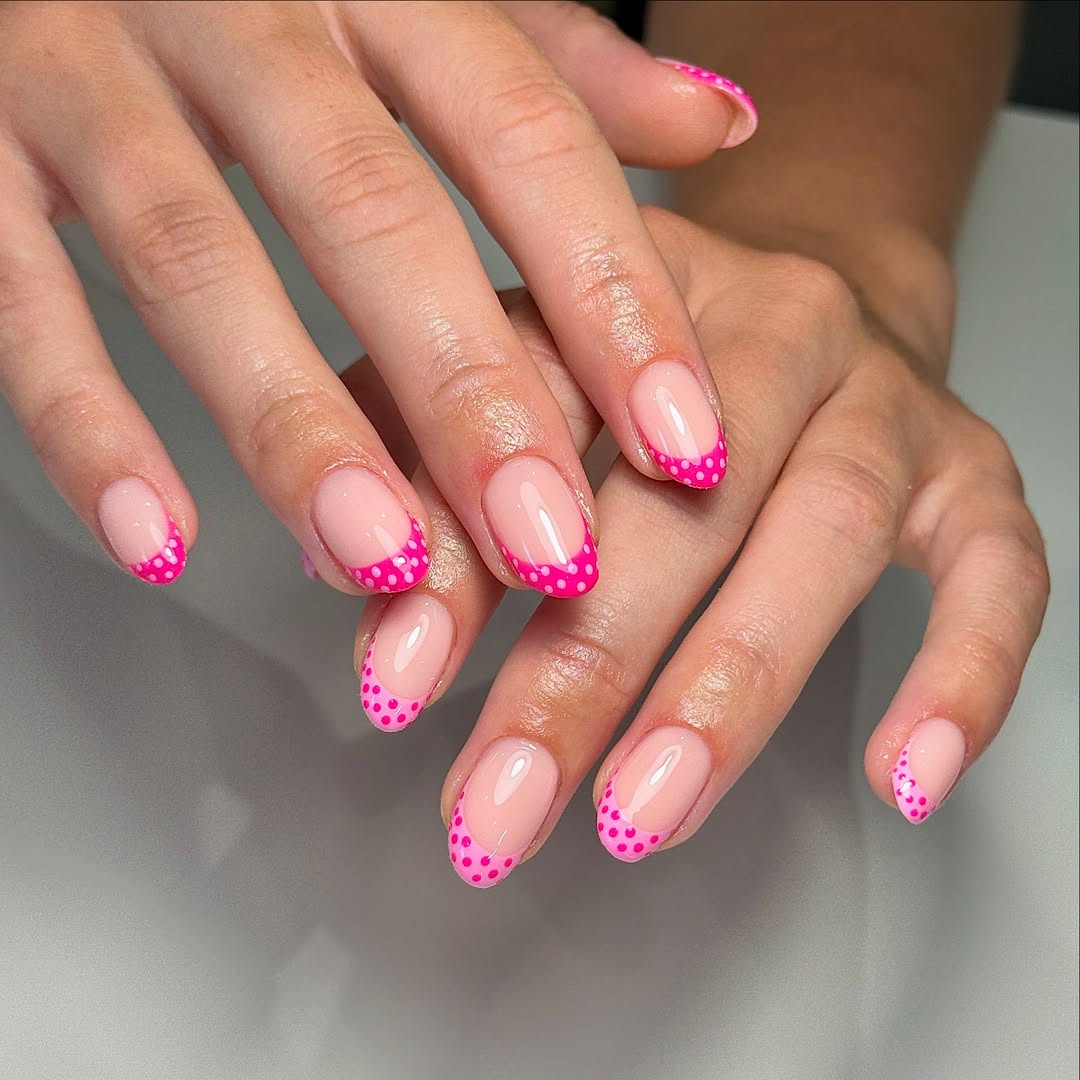 French manicure with pink tips and polka dots