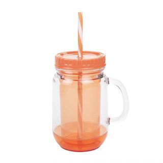 orange coloured drinking jar with straw