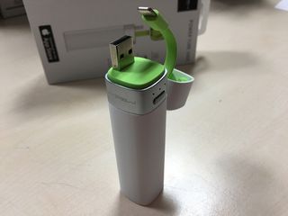 Use the USB to charge it up, and the lightning connector to attach to your iPhone/iPad