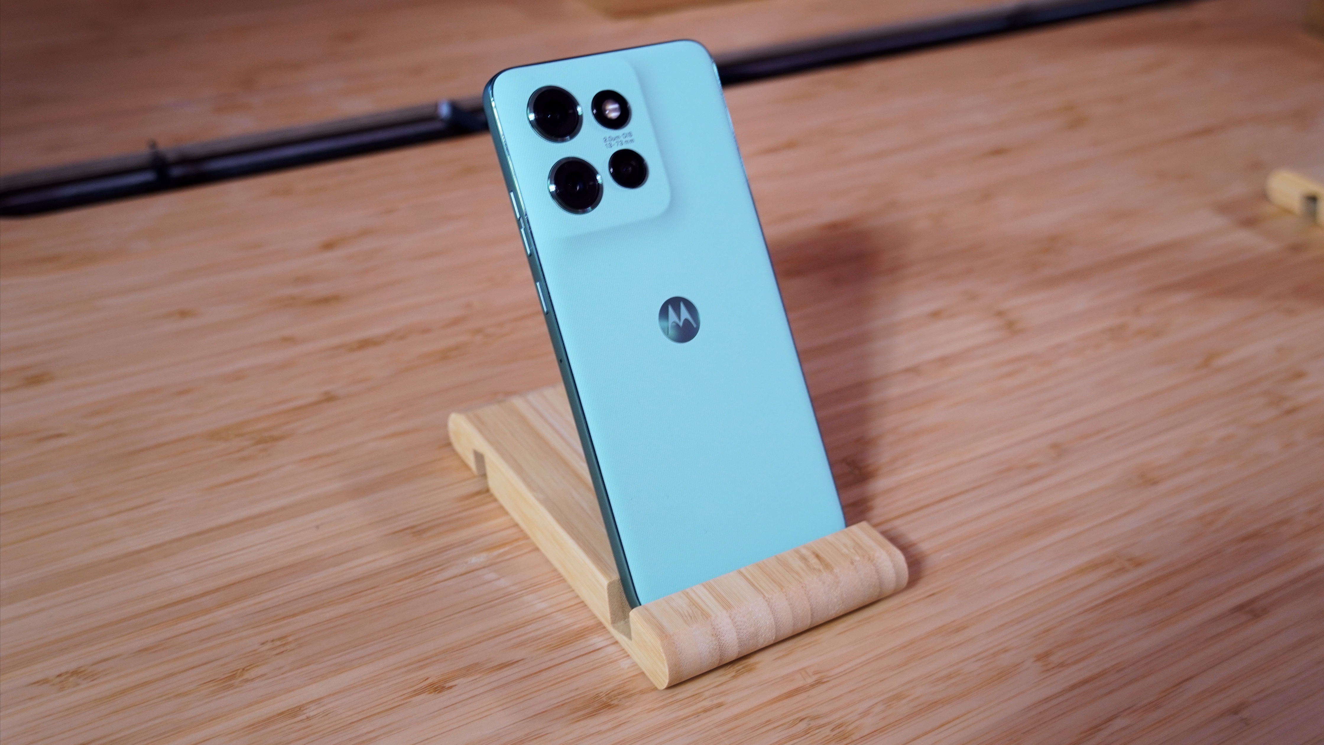 The Motorola Edge 60 Neo in the hand and on display at IFA 2025.