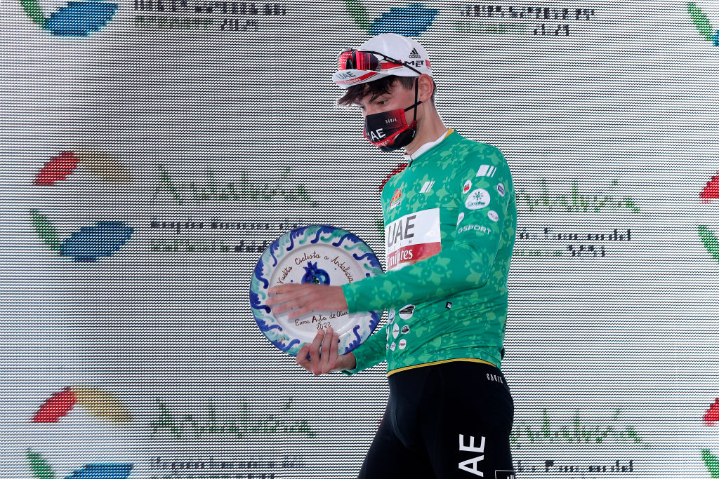 OTURA SPAIN FEBRUARY 18 Alessandro Covi of Italy and UAE Team Emirates celebrates at podium as green points jersey winner after the 68th Vuelta A Andalucia Ruta Del Sol 2022 Stage 3 a 1532km stage from Lucena to Otura 68RdS on February 18 2022 in Otura Spain Photo by Bas CzerwinskiGetty Images