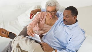 Senior couple work out their finances for aging in place succesfully