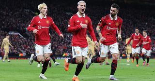 Manchester United draw Real Betis in Europa League last-16: Antony of Manchester United celebrates with teammates Bruno Fernandes and Alejandro Garnacho after scoring the team's second goal during the UEFA Europa League knockout round play-off leg two match between Manchester United and FC Barcelona at Old Trafford on February 23, 2023 in Manchester, England.