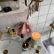 @michellerosedrumm perfumes on a sink