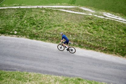 Male cyclist riding his bike outside