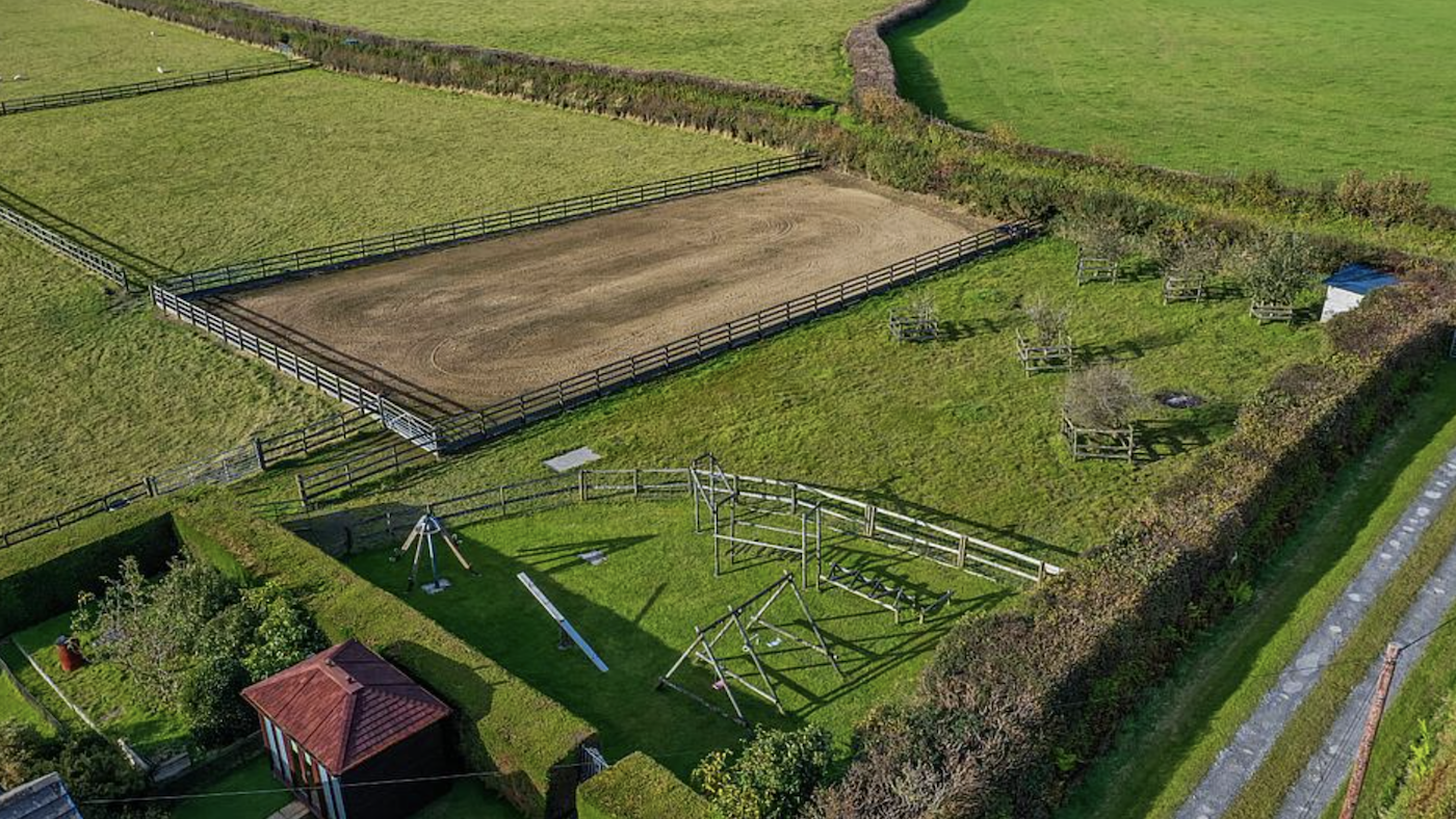 Birds-eye view of paddocks and riding arena