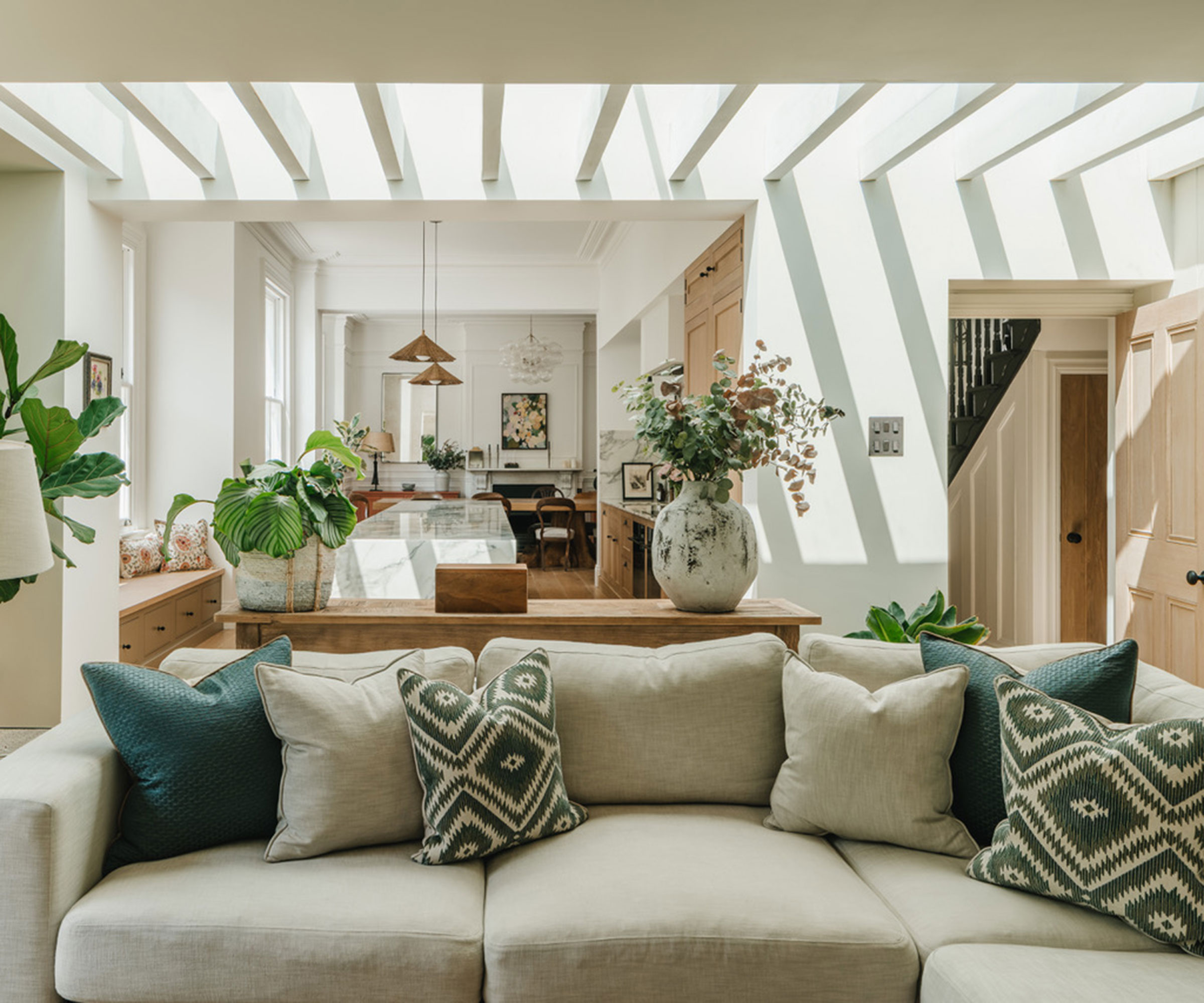 open plan living room with ceiling glazing with fins for shading