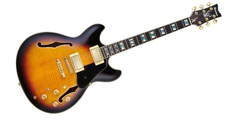 It certainly looks impressive in the Vintage Yellow Sunburst and the laminated flame maple is used for the whole body