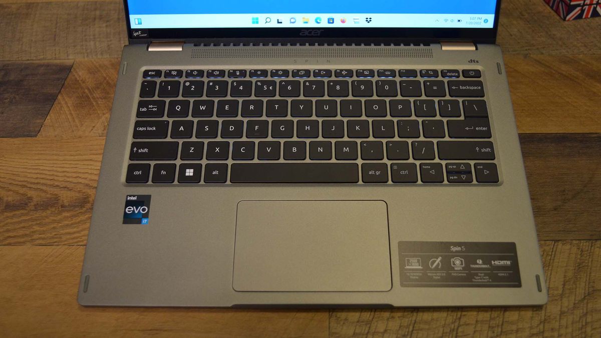An Acer Spin 5 (2022) on a wooden deskl