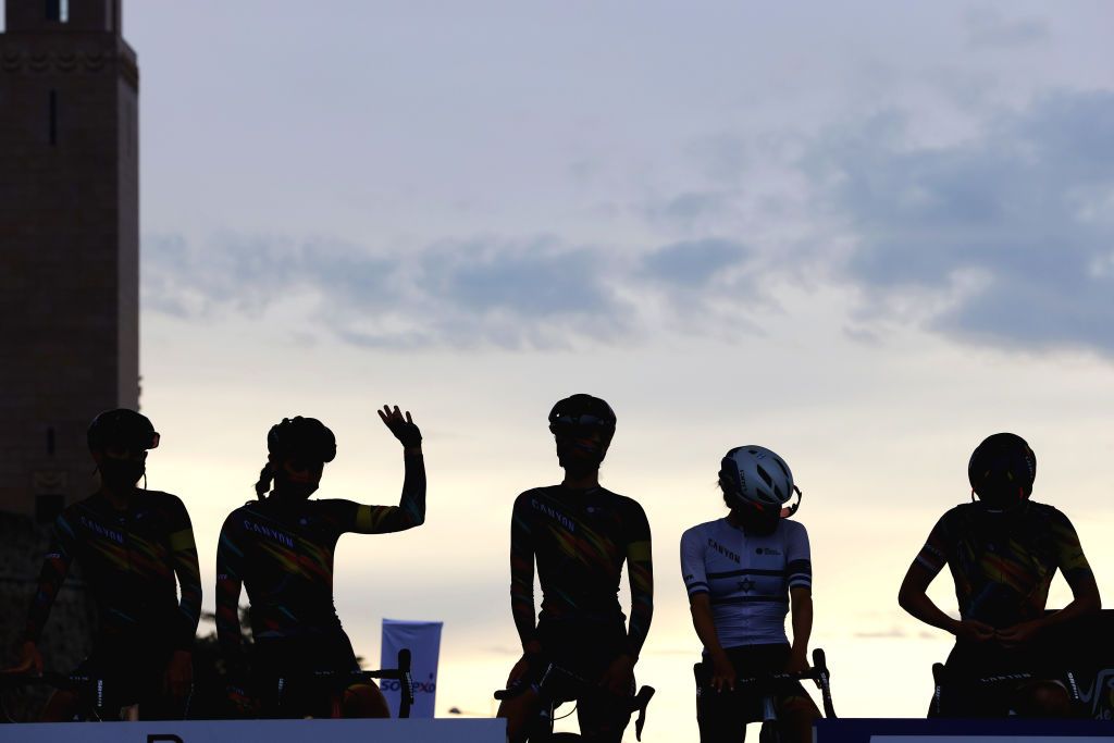 LANDERNEAU FRANCE JUNE 26 Katarzyna Niewiadoma of Poland Hannah Barnes of United Kingdom Elise Chabbey of Switzerland Tiffany Cromwell of Australia Mikayla Harvey of New Zealand Omer Shapira of Israel and Team Canyon SRAM Racing at start during the 8th La Course By Le Tour De France 2021 a 1077km race from Brest to Landerneau Cte De La Fosse Aux Loups 176m Team Presentation Silhouette LaCourse LeTour TDF2021 UCIWWT on June 26 2021 in Landerneau France Photo by Tim de WaeleGetty Images