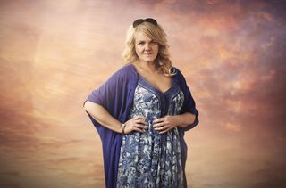 Sally Lindsay in a blue dress as Emma in Love Rat.