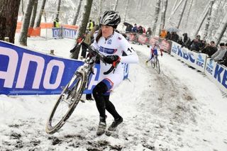 World Cup leader Katie Compton charges up the stairs in Kalmthout
