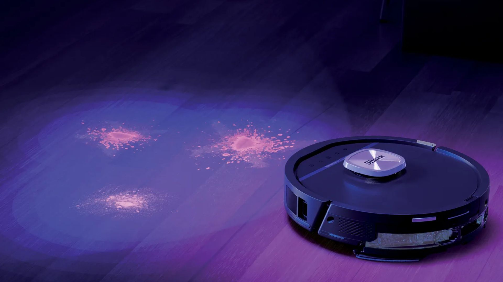 The Shark PowerDetect UV Reveal 2-in-1 Robot Vacuum &amp;amp; Mop showing dirt in a home using UV sensors