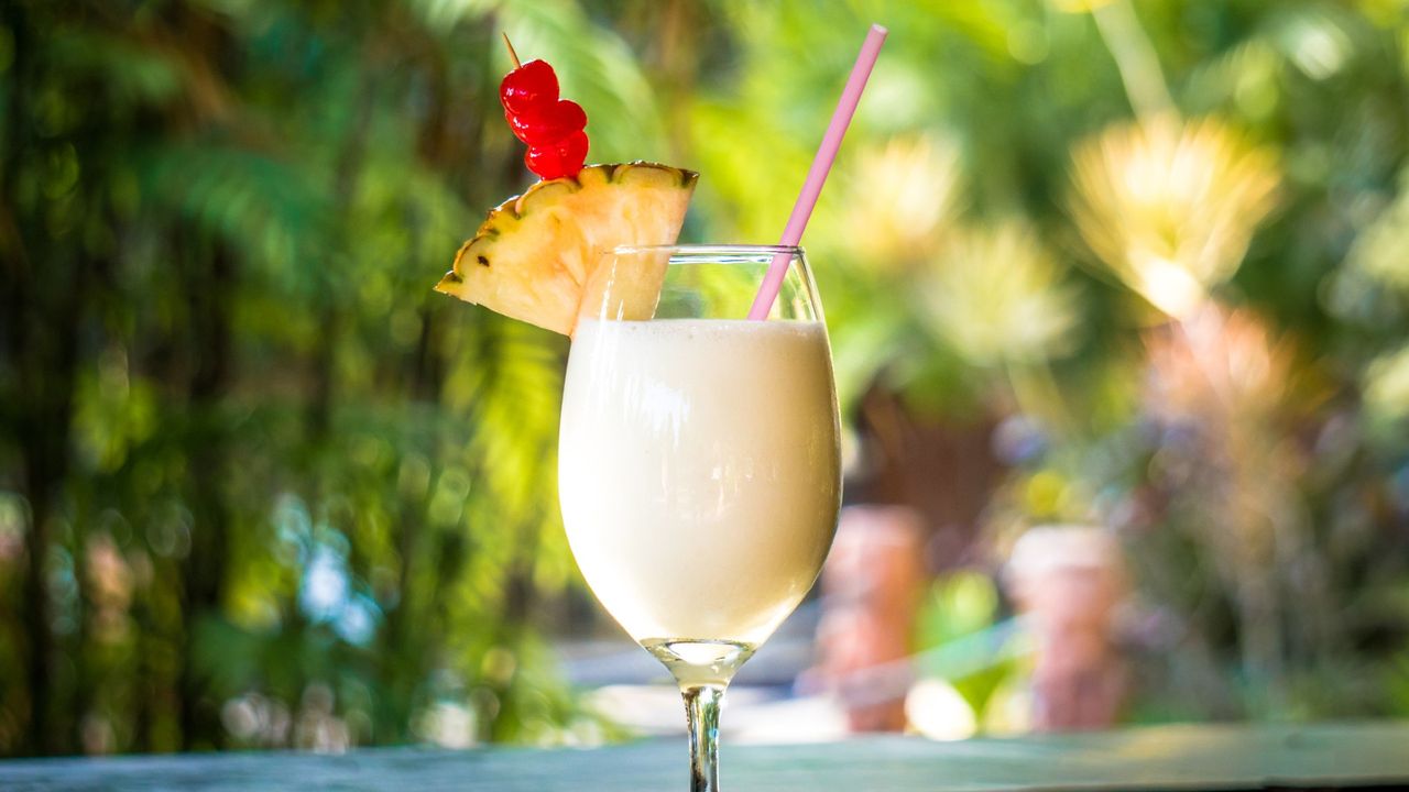 a white frozen drink in an al fresco setting