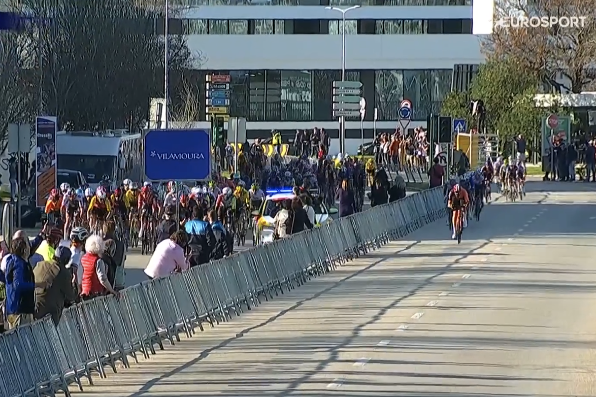 Bizarre finish at Volta ao Algarve 2025, with peloton on wrong side of barriers (far left)