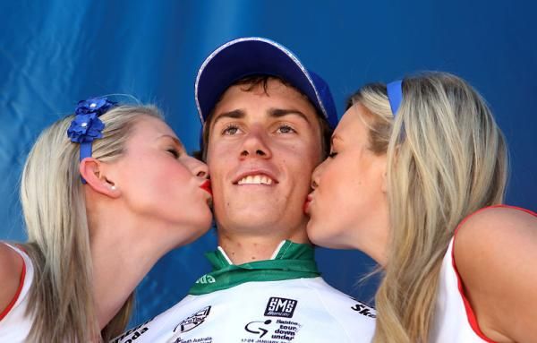 Tim Roe (UniSA) accepts his prize on the Tour Down Under podium.