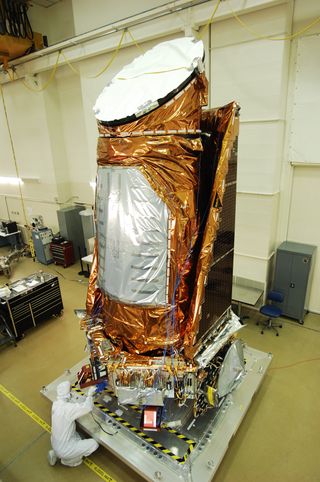 Kepler spacecraft fully assembled in the clean room facility at Ball Aerospace in Boulder, Colorado.
