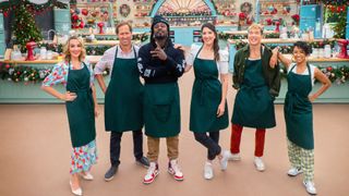 The cast of The Great American Baking Show Celebrity Holiday posing