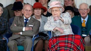 BRAEMAR, UNITED KINGDOM - SEPTEMBER 02: (EMBARGOED FOR PUBLICATION IN UK NEWSPAPERS UNTIL 48 HOURS AFTER CREATE DATE AND TIME) Prince Philip, Duke of Edinburgh and Queen Elizabeth II attend the 2017 Braemar Gathering at The Princess Royal and Duke of Fife Memorial Park on September 2, 2017 in Braemar, Scotland.