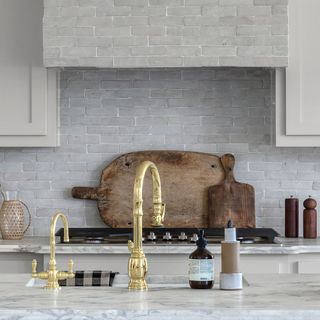 a kitchen with white countertop