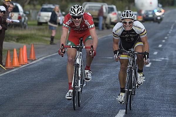 Ben Grenda (left) of Praties and Malcolm Rudolph (Budget Forklifts) charge to the line for the minor placings behind Darren Rolfe.