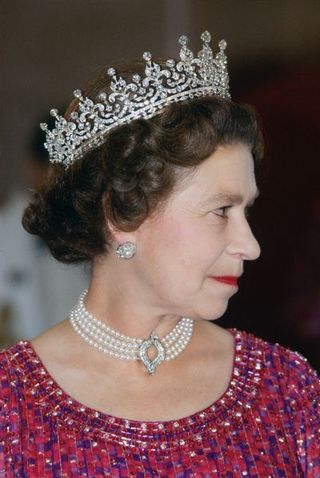 bangladesh november 16 queen elizabeth ii wears a four strand diamond and pearl choker with grannys tiara to an engagement in bangladesh photo by tim graham photo library via getty images
