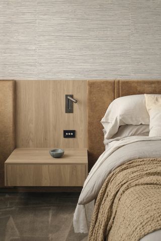 A bedroom fitted with smart headboard