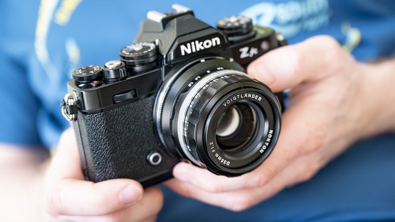 Voigtlander D 35mm f1.2 Nokton lens in the hand