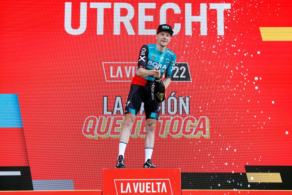 UTRECHT NETHERLANDS AUGUST 20 Sam Bennett of Ireland and Team Bora Hansgrohe celebrates winning the stage on the podium ceremony after the 77th Tour of Spain 2022 Stage 2 a 1751km stage from sHertogenbosch to Utrecht LaVuelta22 WorldTour on August 20 2022 in Utrecht Netherlands Photo by Bas CzerwinskiGetty Images