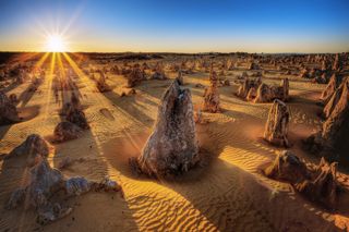 The sunrise over the Pinnacles Desert in Australia