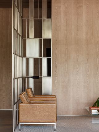 Interior of Brazilian apartment with leather armchairs
