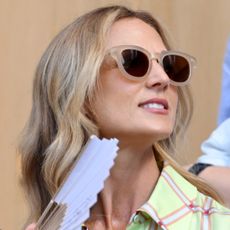 Harriet Sperling using a fan at Wimbledon