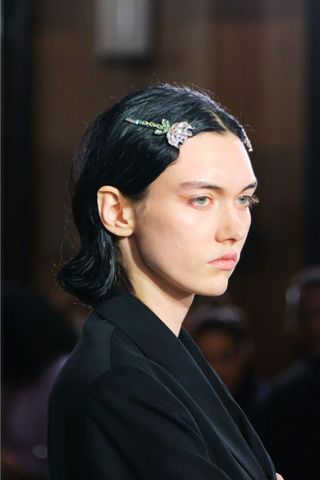 A model at Simone Rocha SS25 wearing the semi-updo, a key Spring/Summer 2025 Fashion Month Beauty Look