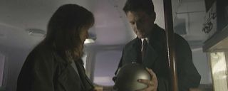 Hey, Not Scully. We keep seeing people dying of radiation poisoning, and I found this lead sphere. Wanna play catch?