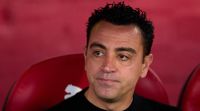 Barcelona coach Xavi looks on during his side's LaLiga game at Girona in May 2024.
