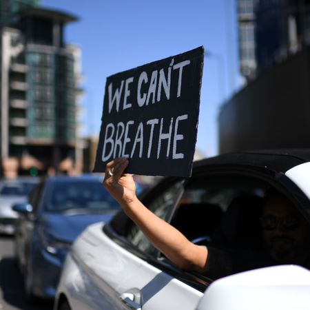 topshot a sign displaying the message we cant breathe is held out of a car window as demonstrators make their way towards the us embassy in central london on may 31, 2020 to protest the death of george floyd, an unarmed black man who died after a police officer knelt on his neck for nearly nine minutes during an arrest in minneapolis, usa hundreds of people gathered in central london to protest the death of george floyd, an unarmed black man who died while being arrested in minneapolis, usa photo by daniel leal olivas afp photo by daniel leal olivasafp via getty images