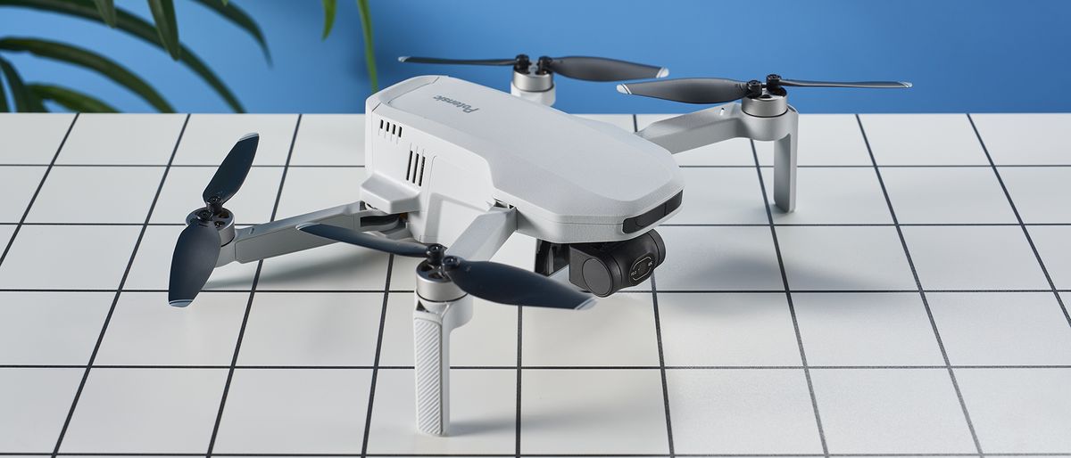 A gray Potensic Atom 4K drone