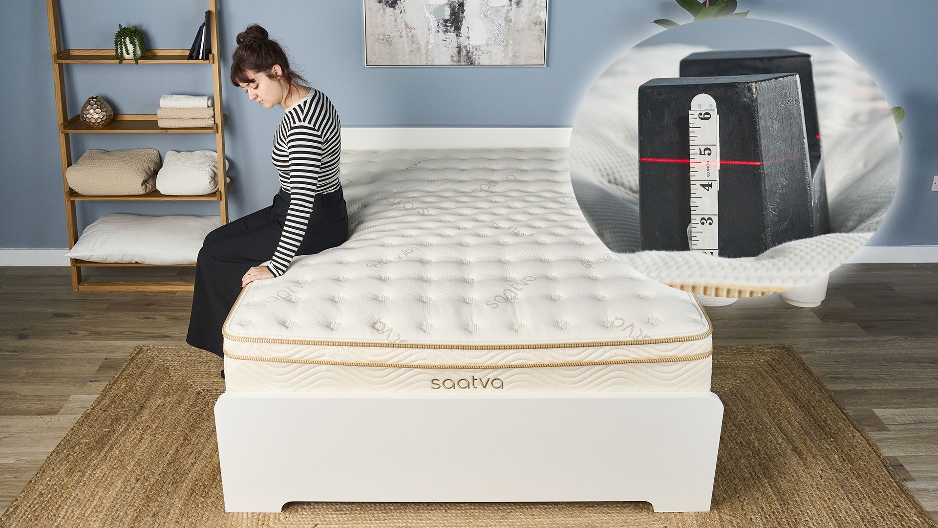 This image shows mattress tester Lauren Jeffries sitting on the edge of the Saatva Classic mattress on a bed frame in our testing studio. In the top right corner is an inset image showing a close up of a 10kg weight balancing easily on the edge of the Saatva Classic mattress.