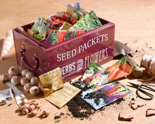 Seed tin with various seed packets