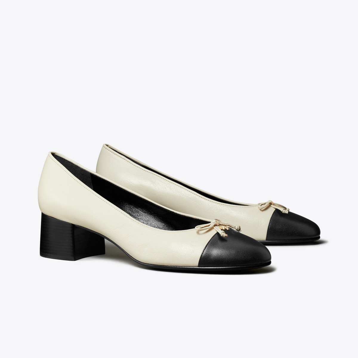 Cap-Toe Pump in White, Size 9.5