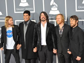 Foo Fighters display a united front on arrival at the 54th Grammy Awards ceremony