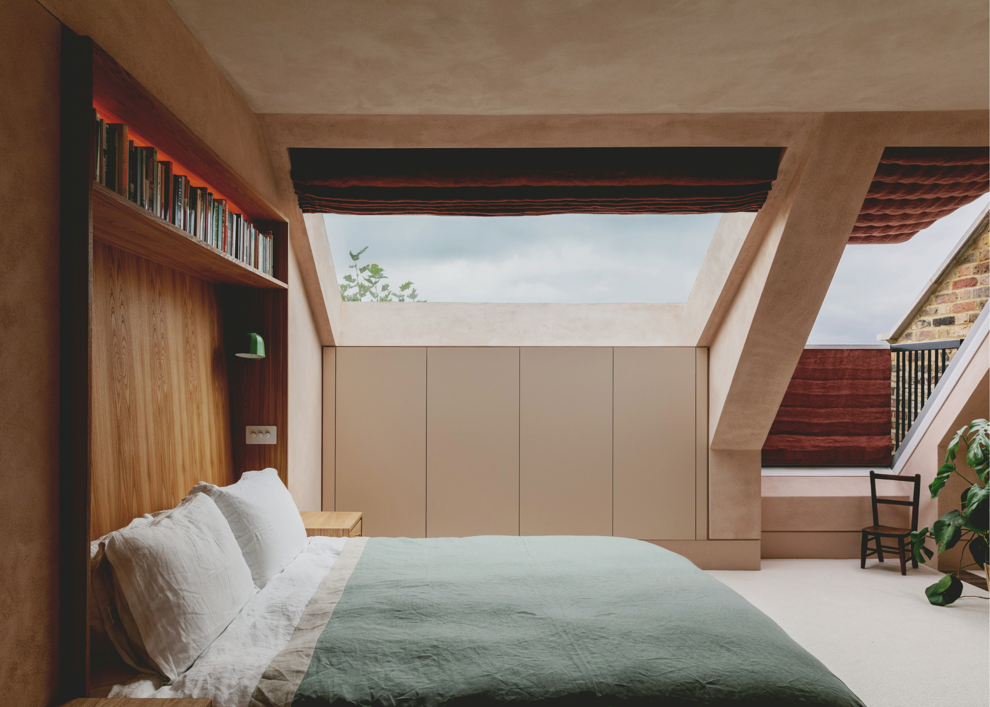 clay colored loft bedroom with lots of hidden storage
