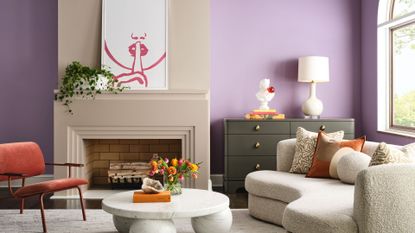 A modern sitting room with bright purple walls