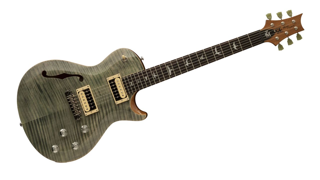 That's a flame maple veneer in Trampas Green - actually closer to a blue-green denim