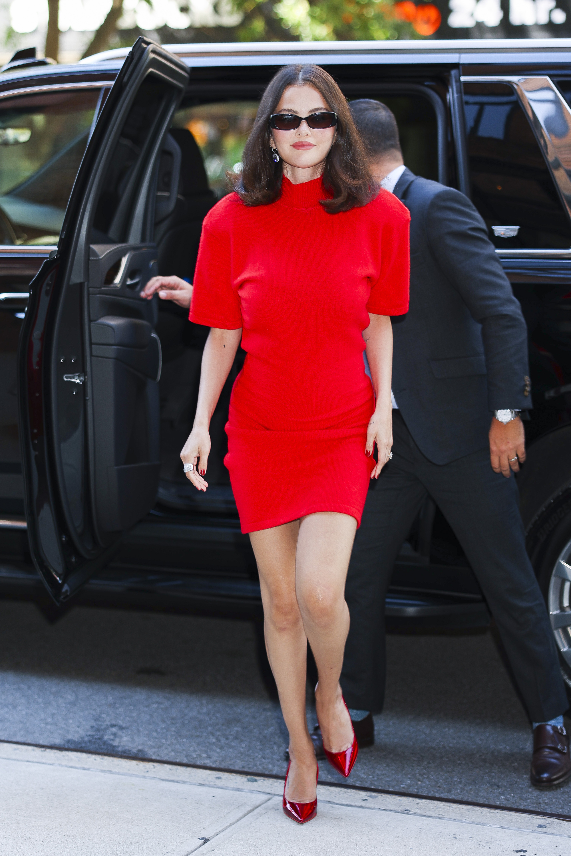 Selena Gomez wore two mini dresses yesterday, including a red Jacquemus version