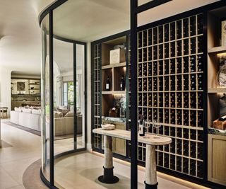 wine store and home bar with curved glass wall
